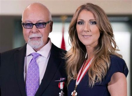 Celine Dion poses a picture with her deceased husband Rene Angelil.